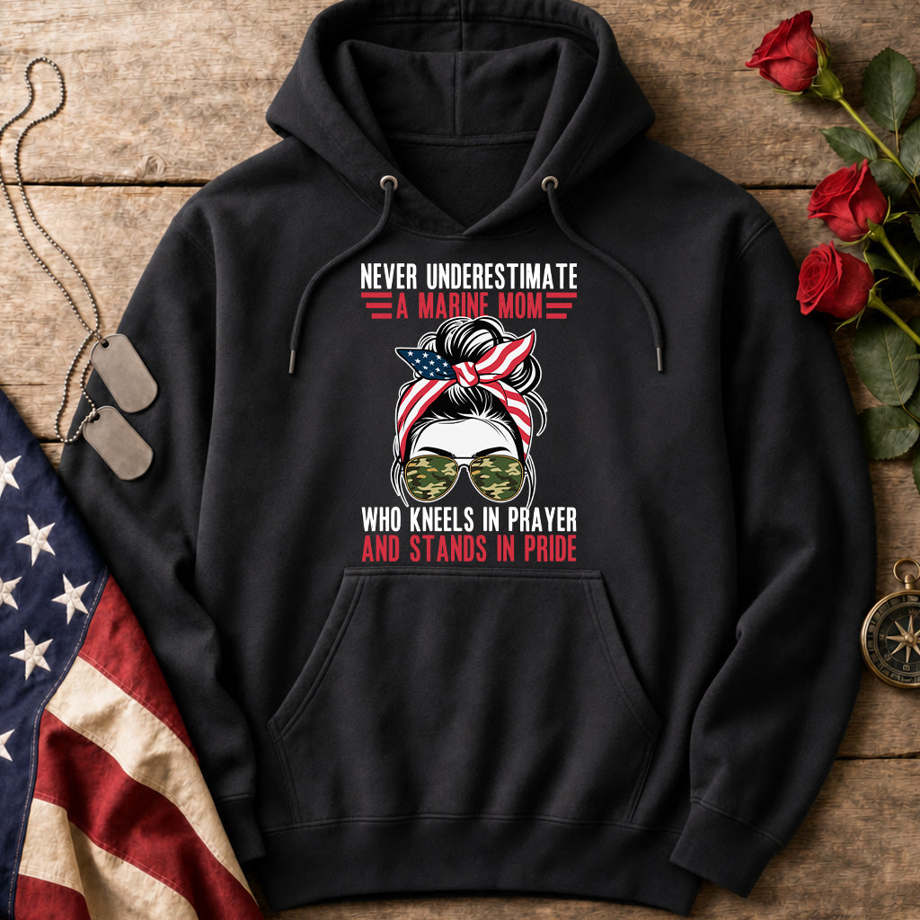 Never Underestimate a Marine Mom black hoodie with messy bun, patriotic bandana and camo sunglasses design