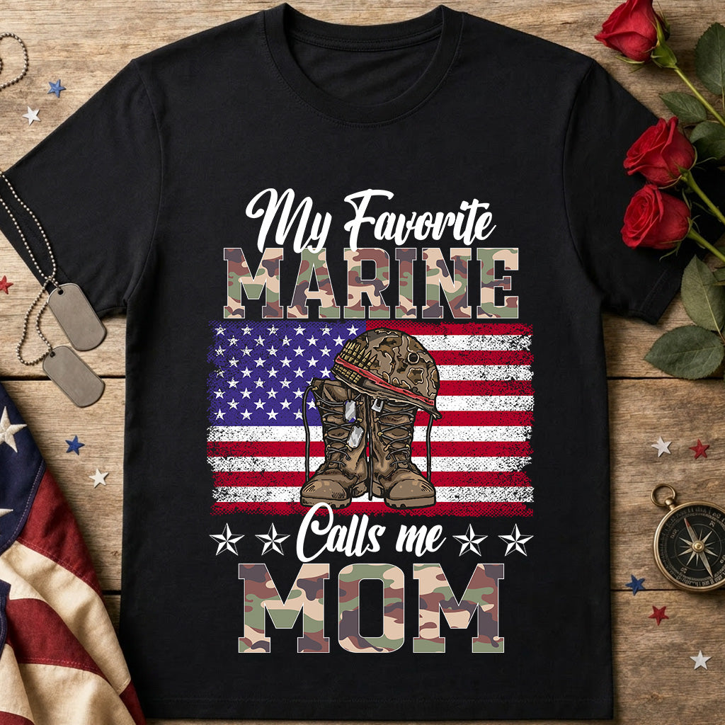 My Favorite Marine Calls Me Mom black T-Shirt with camo lettering, military boots and distressed American flag design