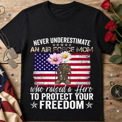 Never Underestimate an Air Force Mom black T-Shirt with distressed American flag, military boots and floral design